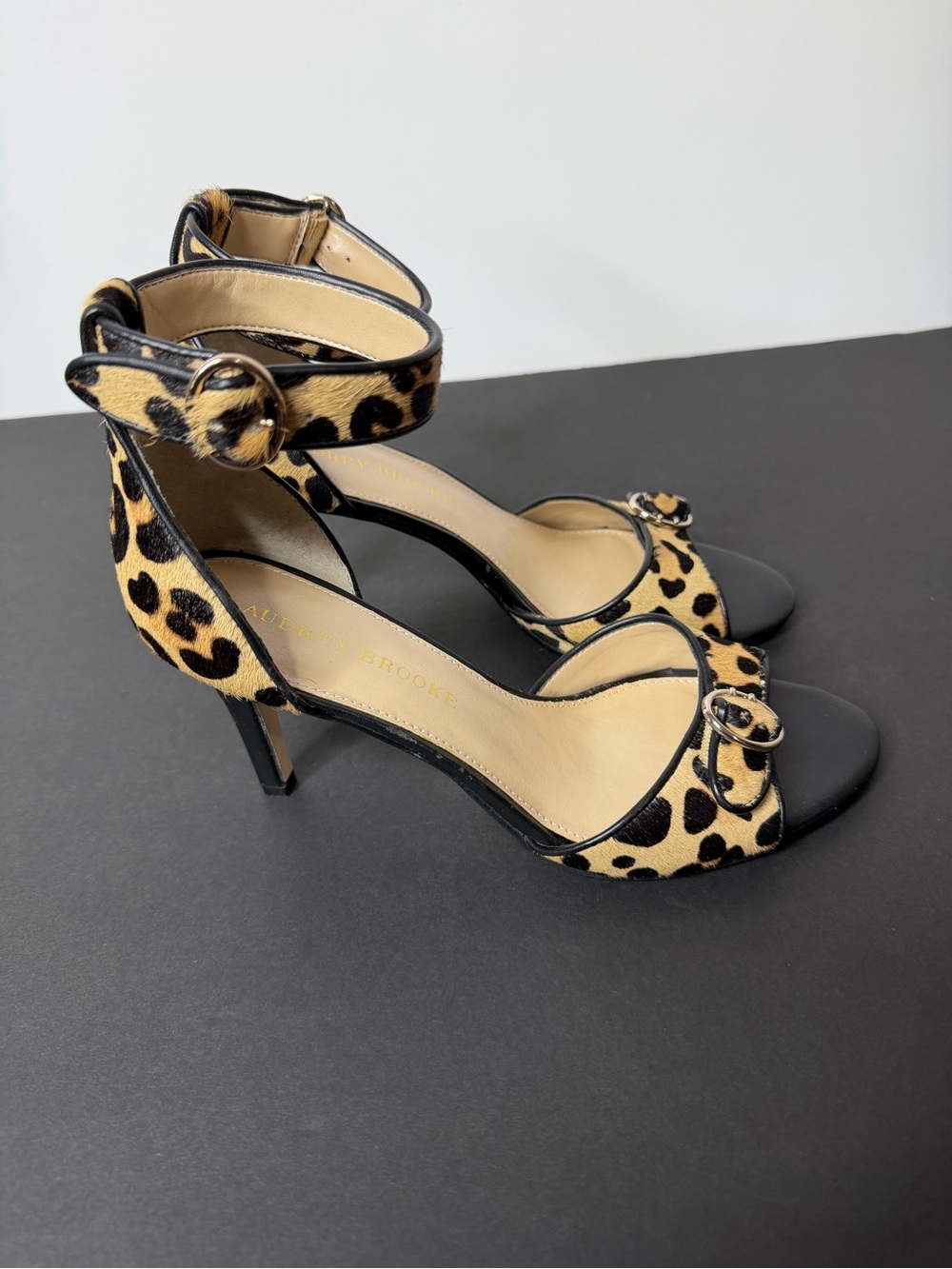Audrey Brooke Leopard Print Ankle-Strap Heels in Black and Tan